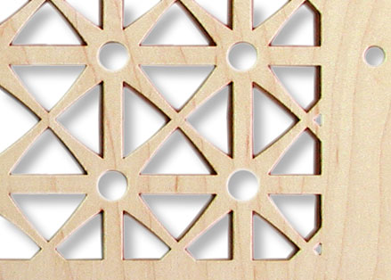 Triangulation geometric wood air vent in maple closeup